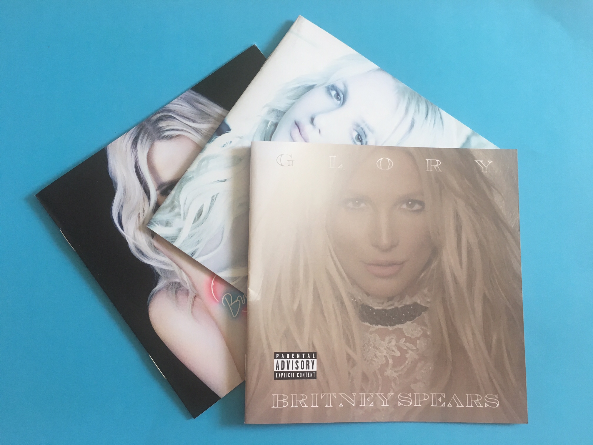Britney Cover Glory und Vorgänger